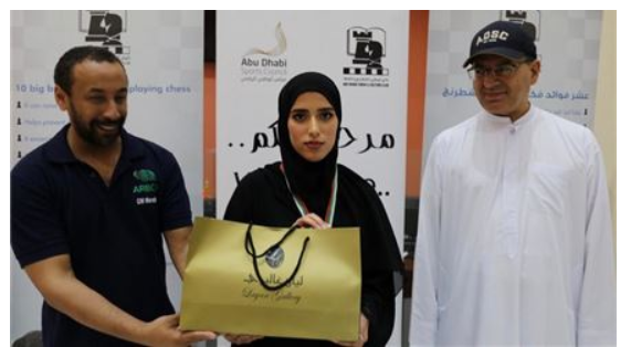 Al Ain Customer Happiness Center honors Ousha Al Shamsi for Ranking First at Abu Dhabi Chess Club Championship