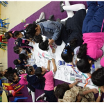 مركز رأس الخيمة يشارك روضة الروابي احتفالها بيوم الطفل العالمي-thumb