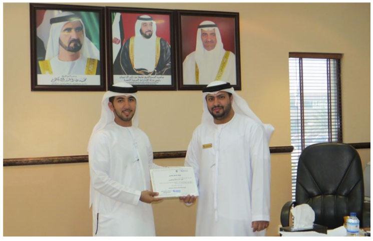 Emirates Post honors two of Emirates ID employees