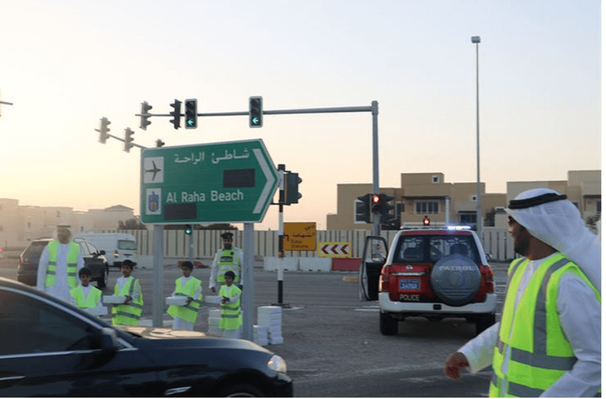 Emirates Identity Authority’s Employees Distribute “Fasters’ Iftar ” meals to drivers ×