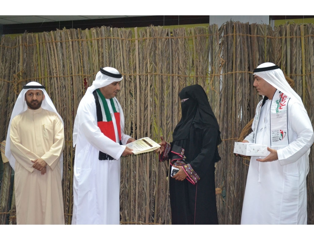 Emirates ID honors woman employee for detecting 3 forged visas at Tasheel Center in Sharjah