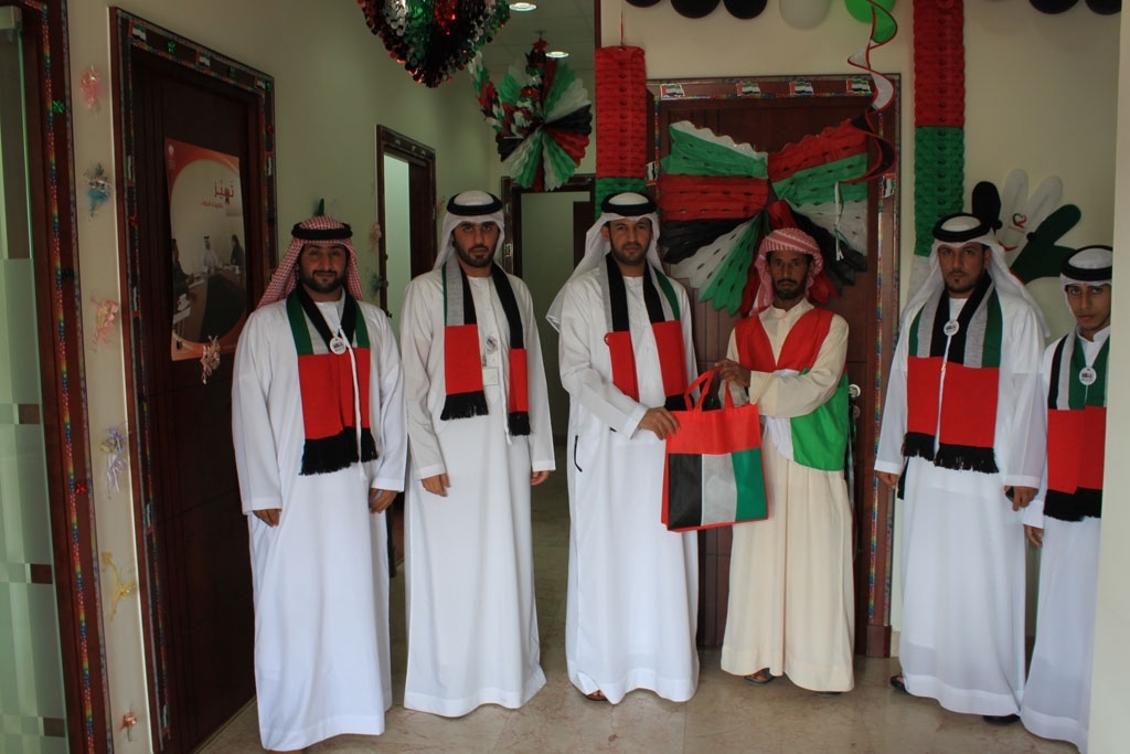 Western Region Centers’ director and employees celebrate National Day